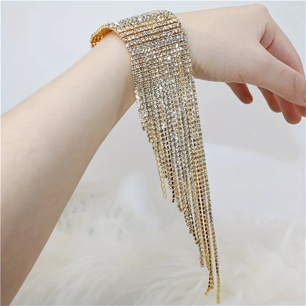 Rhinestone tassel bracelet - gold-color with multi-row, multi-layer design and large rhinestone tassels