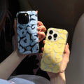 Graffiti iPhone case - vibrant yellow and blue graffiti design on a shockproof silicone back cover