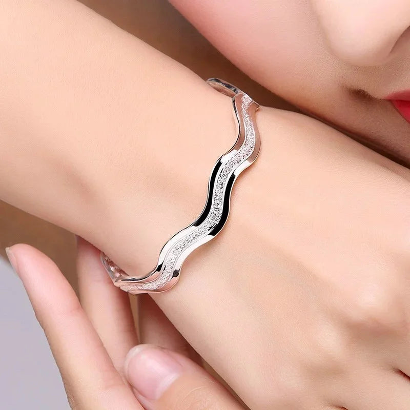 Wavy open bangle bracelet - frosted sterling silver with double line water ripple design