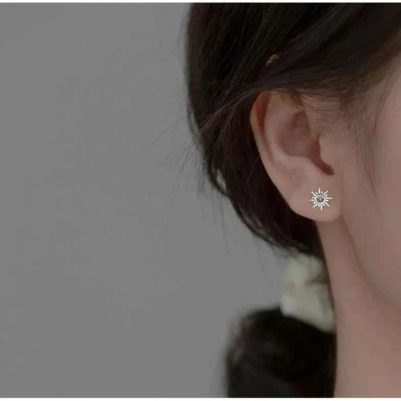 Elegant Sterling Silver Blue Zircon Sun Stud Earrings
