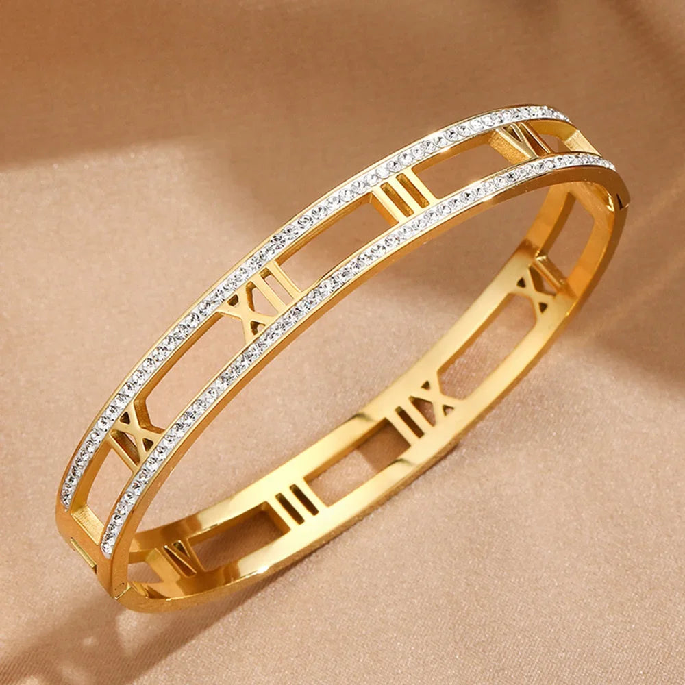 Crystal Roman Numeral Bracelet - Gold-plated stainless steel bangle with hollow Roman numerals and clear crystals