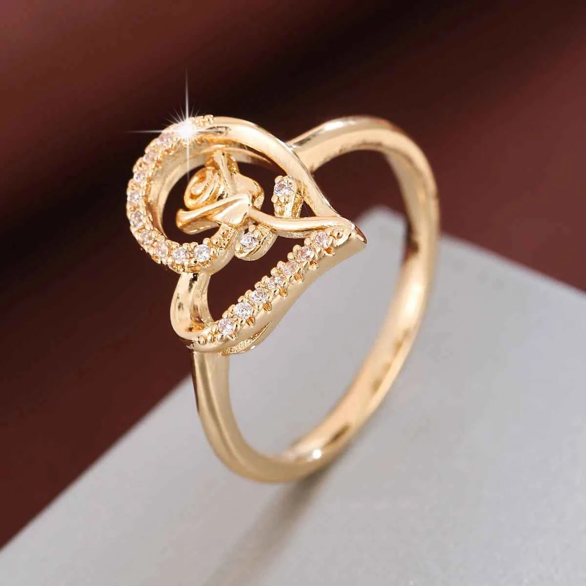 Rose zirconia ring - elegant rose-shaped ring with brilliant cubic zirconia in golden white finish