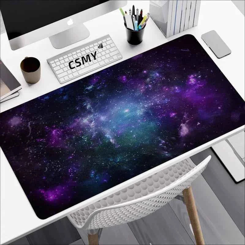 Gaming desk mat - large galaxy print mousepad with smooth fabric surface on a desk