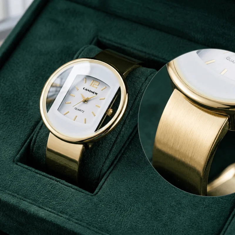 Elegant Ladies Bracelet Watch - gold and silver-toned stainless steel with white dial on a woman's wrist