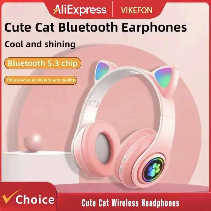 cat ear bluetooth headphones - pink model with LED lights and foldable design on white background